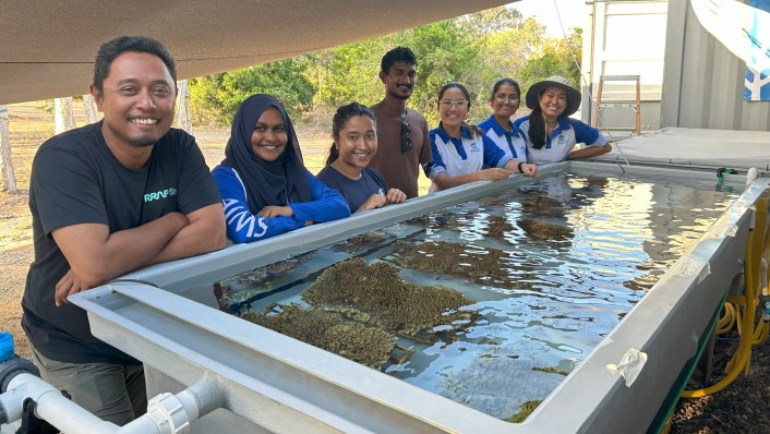 members of ReefSeed team smile at camera